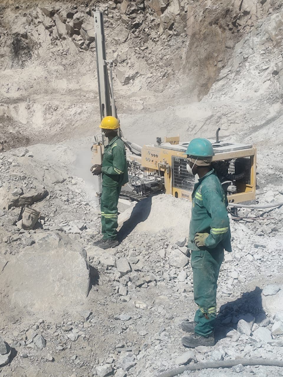 Wood Chucks crew preparing a quarry bench for drilling
