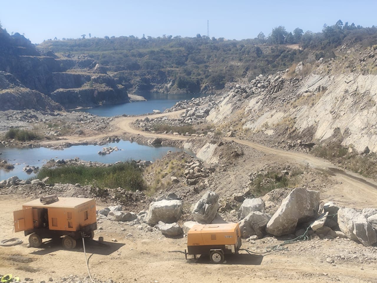 Quarry bench and access road prepared for production work
